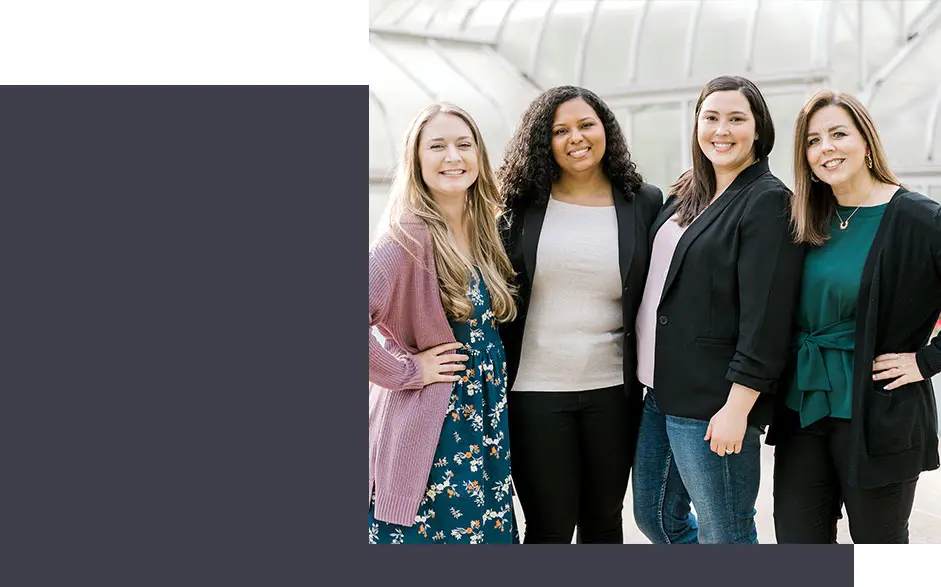 A group of divorce therapists smile and look at the camera. They offer online divorce counseling in Texas.